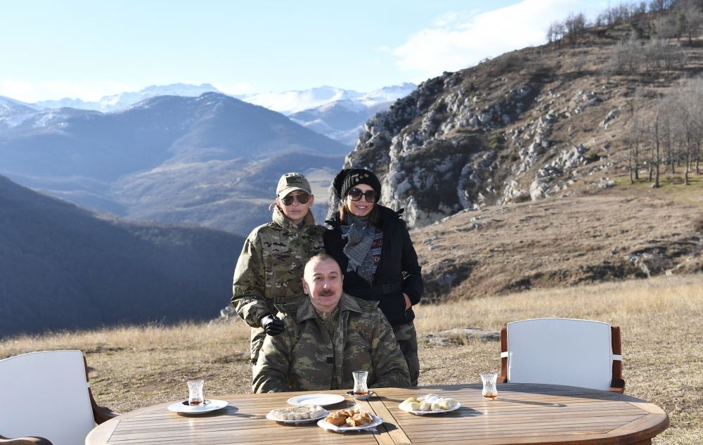We are having tea in pear-shaped glasses, baklava on Jidir Duzu. Let our friends rejoice, enemies get blind! - President Aliyev
