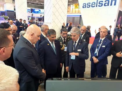 Azerbaijan`s defense minister views products of various companies demonstrated at IDEF’19